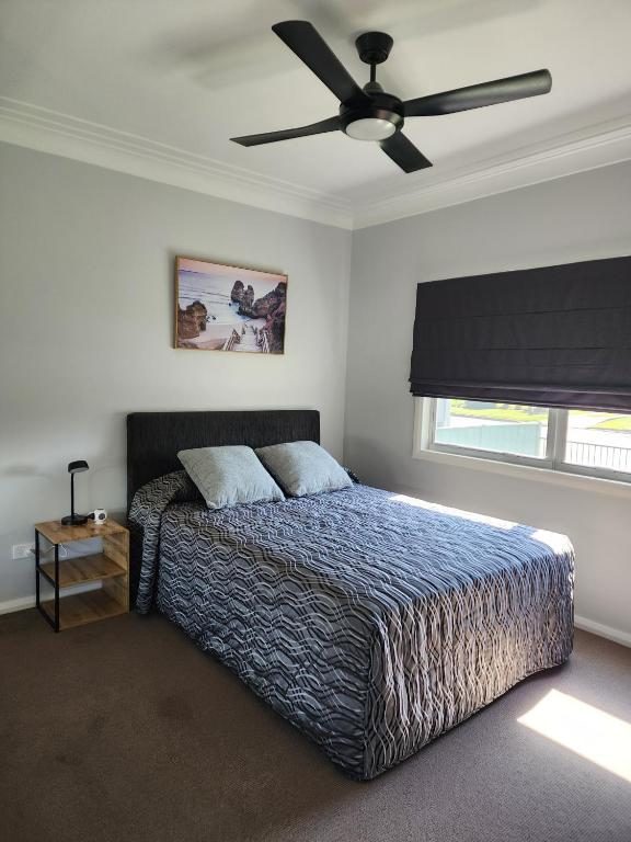 Bedroom in the Three-Bedroom Apartment