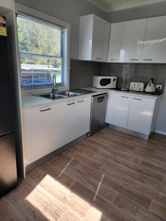 Full kitchen in the Three-Bedroom Apartment