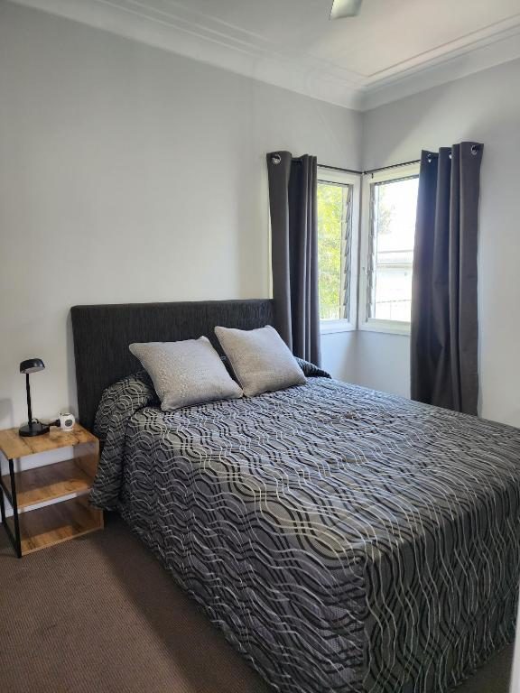Second bedroom in the Three-Bedroom Apartment